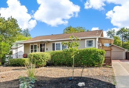Exterior of charming bungalow home, typical of Sulphur, Louisiana